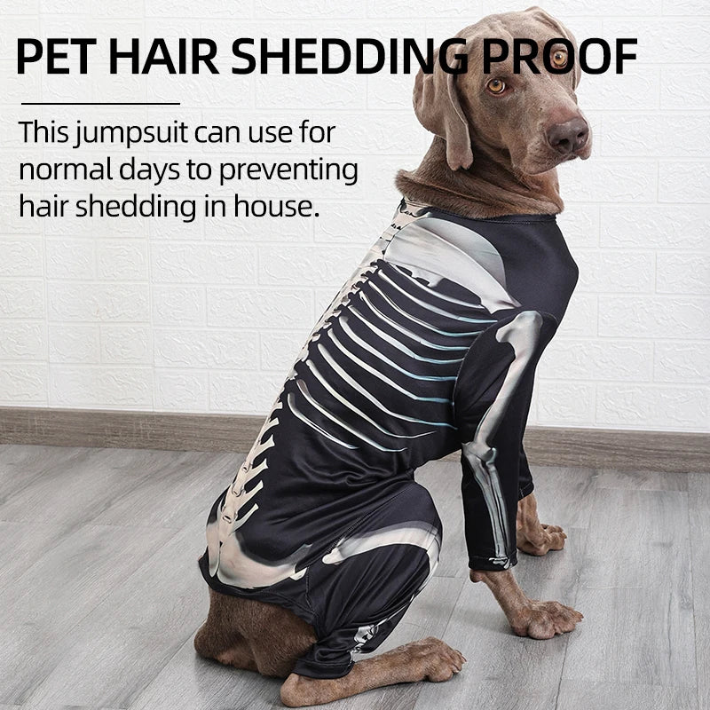 Dog wearing a black and white skeleton-themed jumpsuit on a wooden floor.
