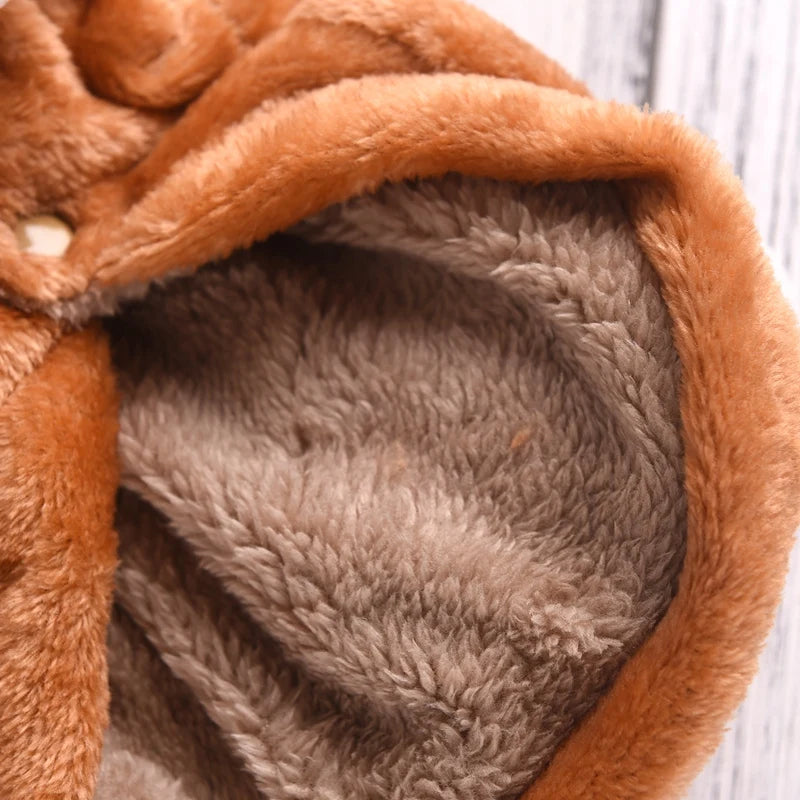 Close-up of brown plush fabric with a textured interior