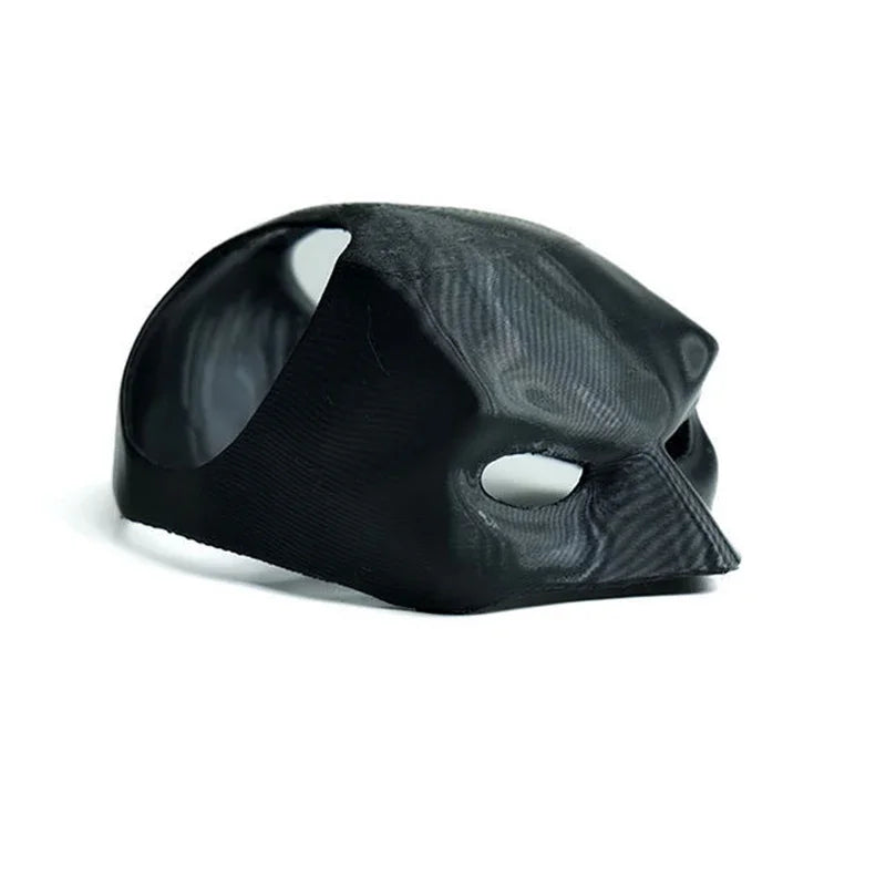 Black and gray helmet with reflective surface on a white background