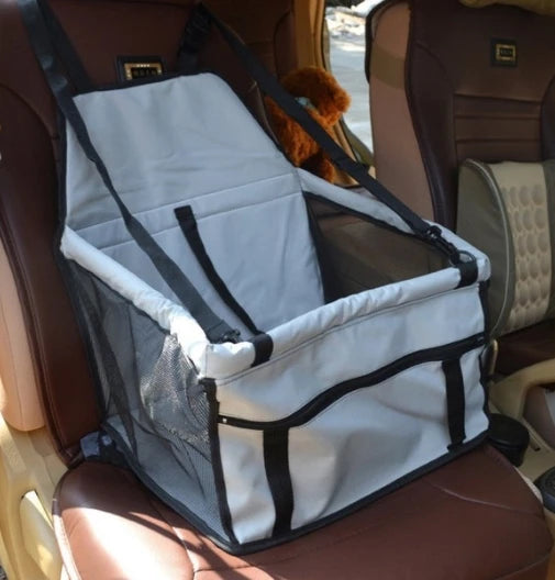 Pet car seat cover on a car seat with a dog inside