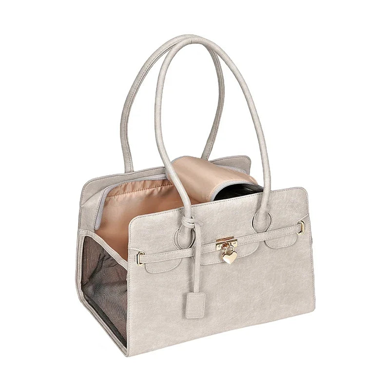 Beige pet carrier with a clear front panel on a white background