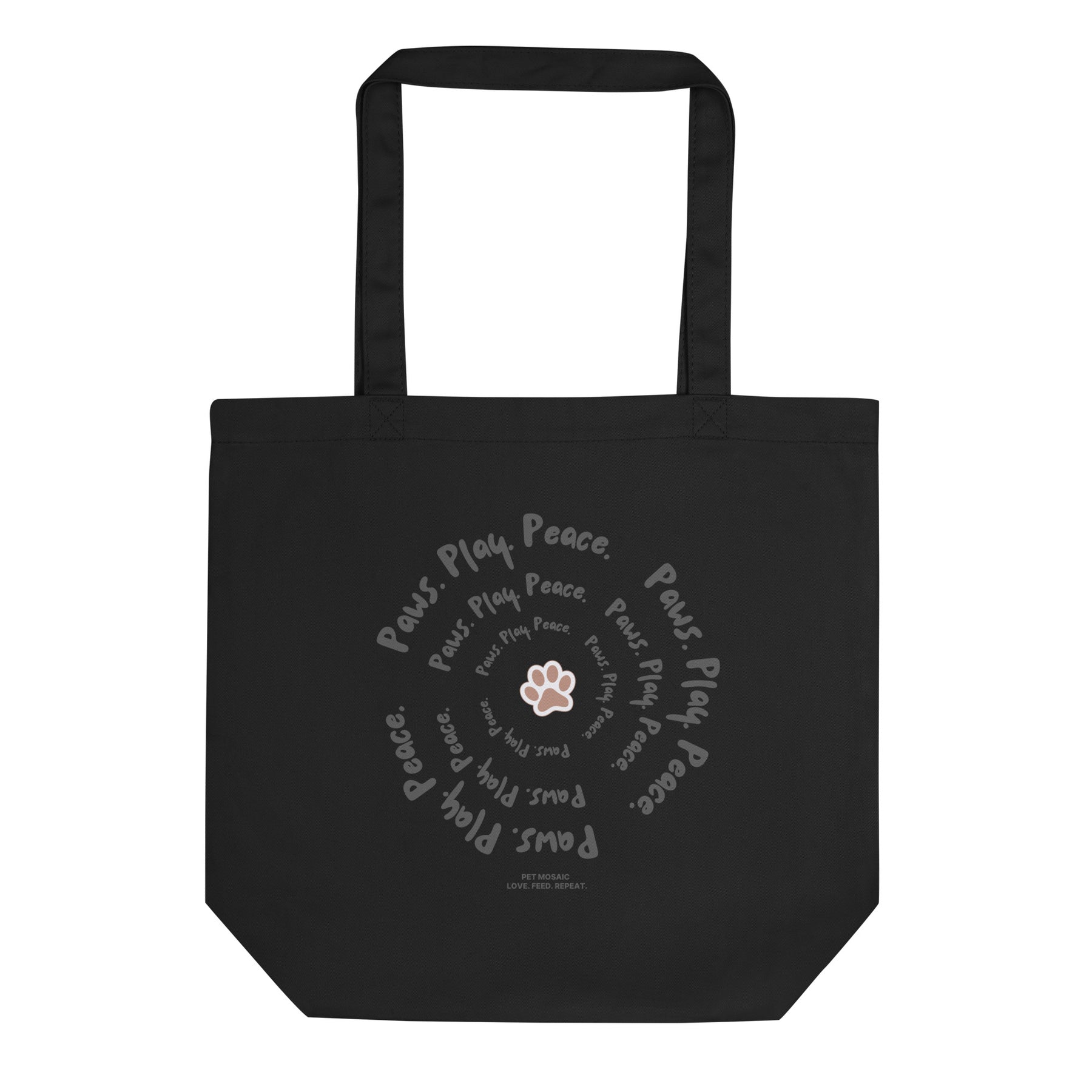 Black tote bag with paw print and text design on a white background
