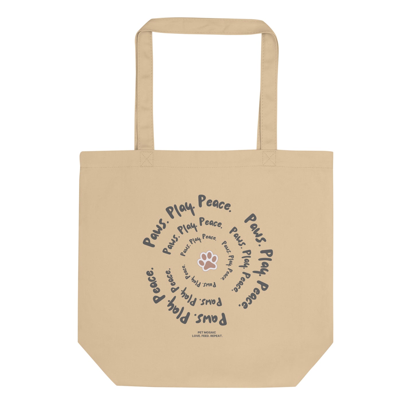 Beige tote bag with text and paw print design on a white background
