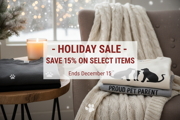 Holiday sale banner showing pet parent apparel and candle with 15% off promotion ending December 15