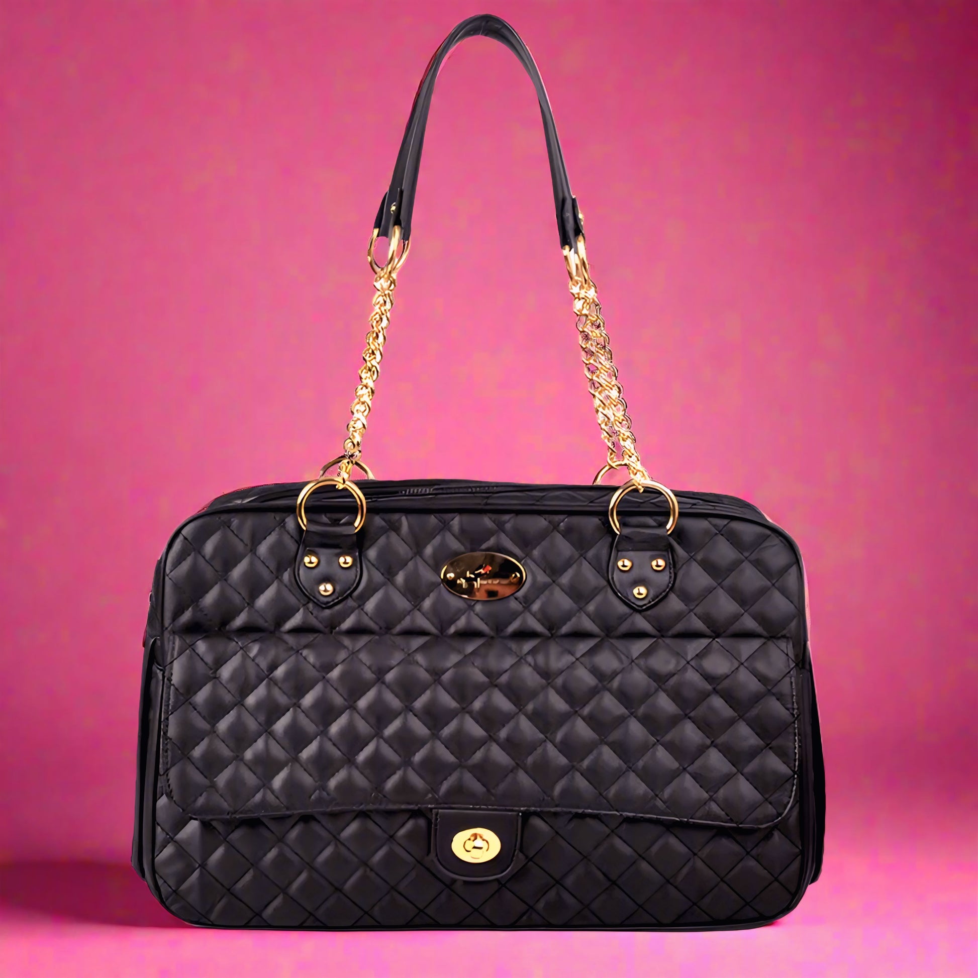 Black quilted handbag with gold accents on a pink background