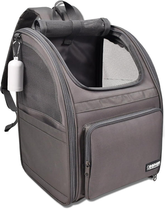 Small pet backpack carrier in grey showing comfortable shoulder straps and mesh ventilation