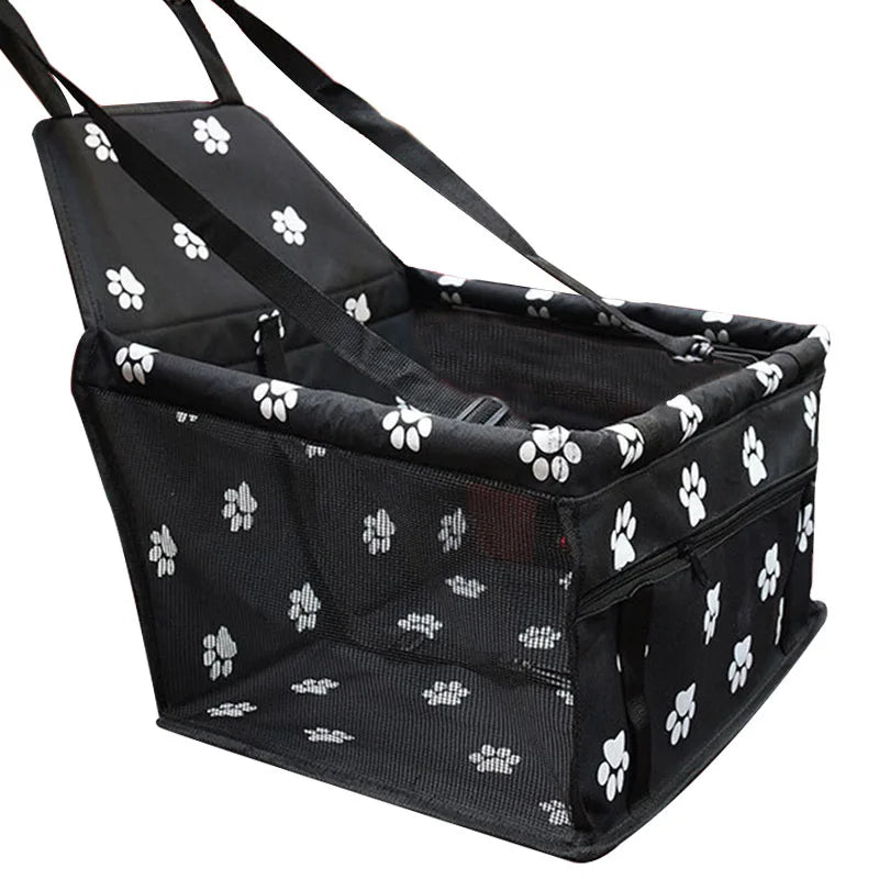Black pet carrier with white paw prints on a white background