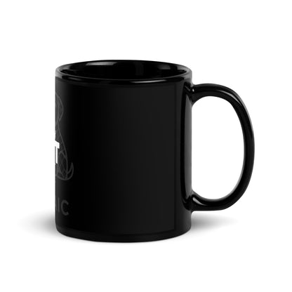 Black mug with white text on a white background