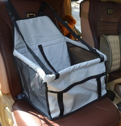 Pet car seat cover on a car seat with a dog inside