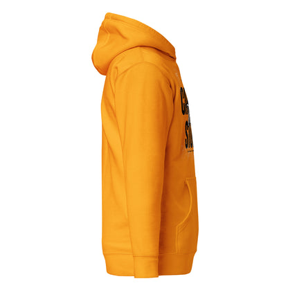 Yellow hoodie with text on sleeve against a white background
