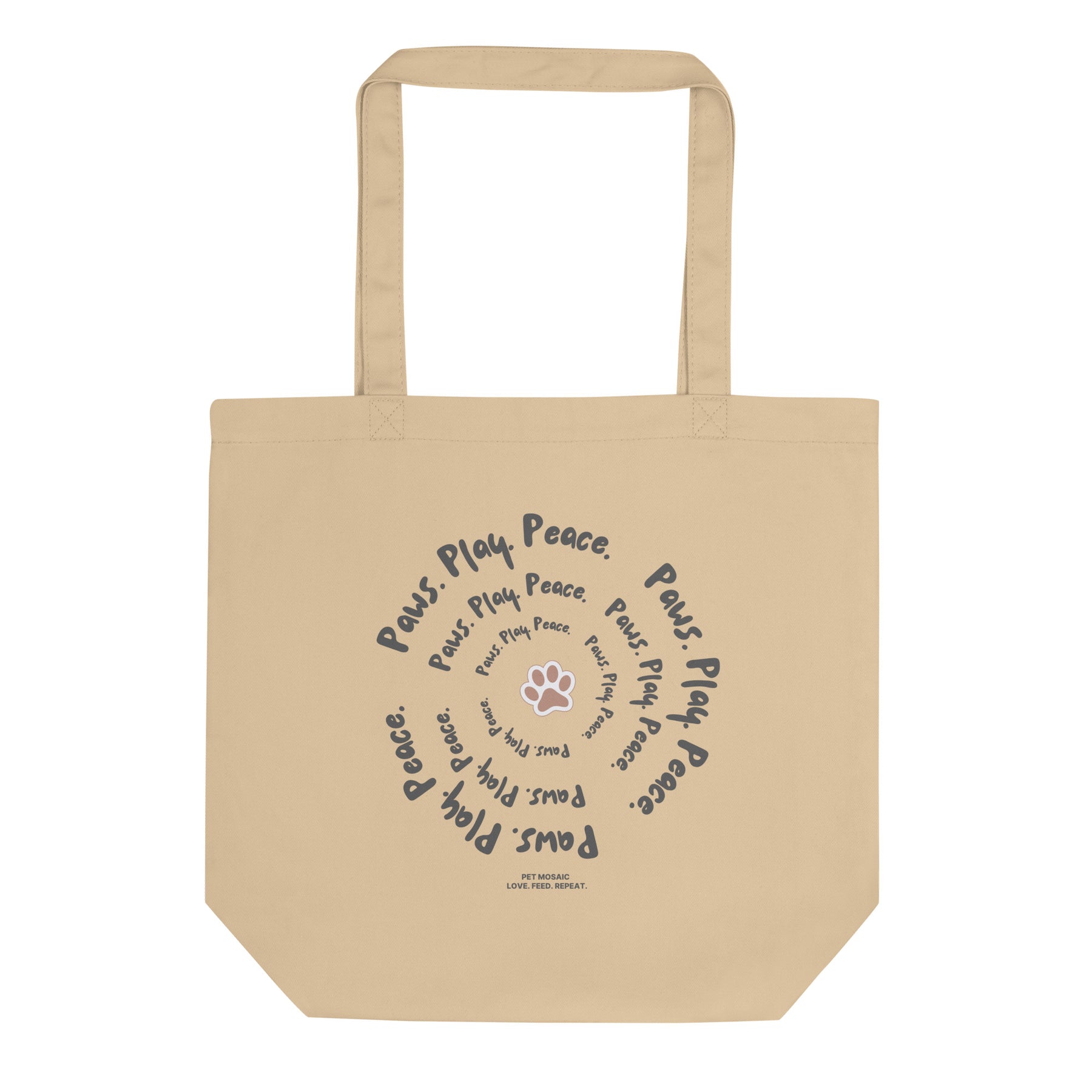 Beige tote bag with text and paw print design on a white background