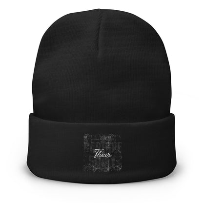 Black beanie with 'Capture Their Story' embroidery on a white background