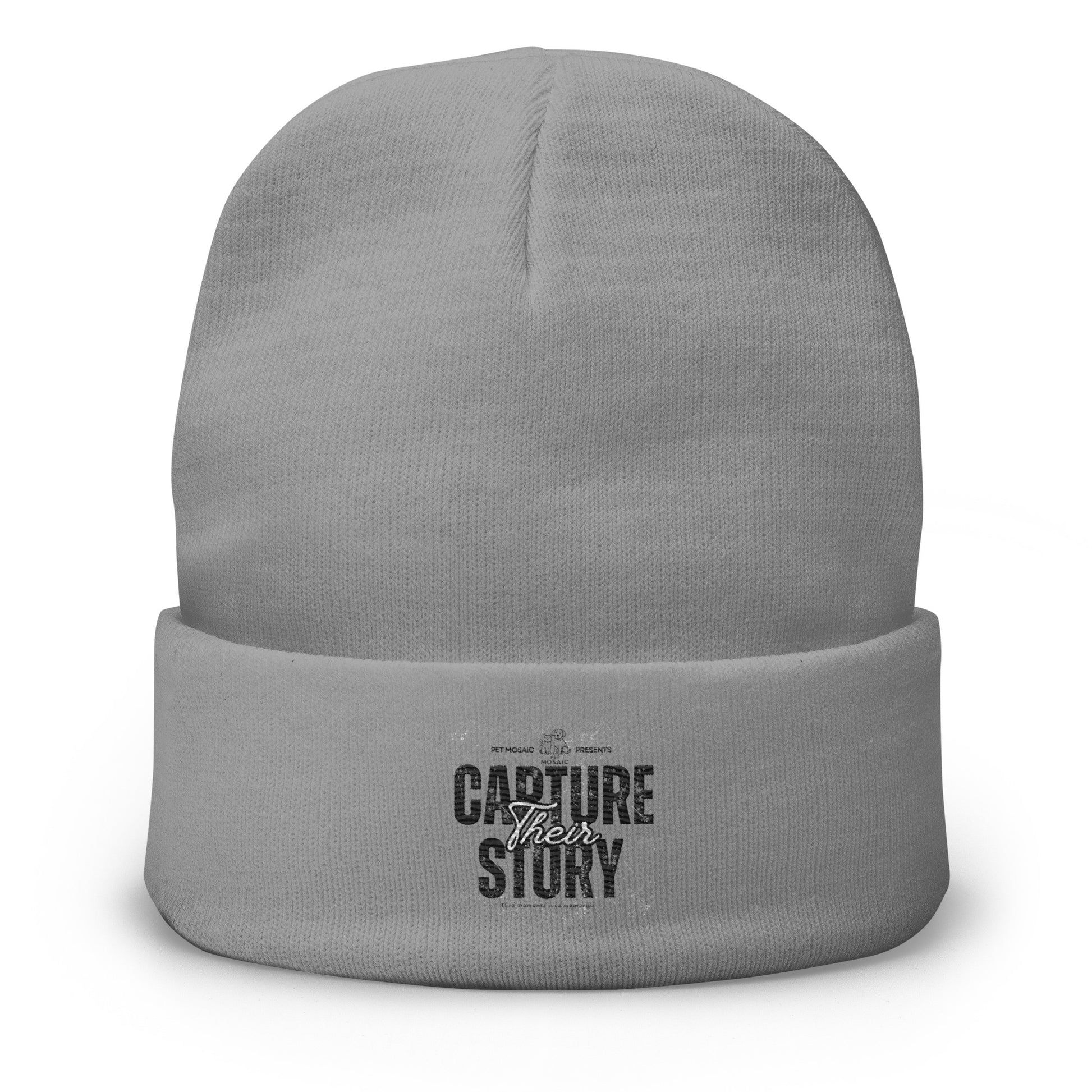 Gray beanie with 'Capture Their Story' text on a white background