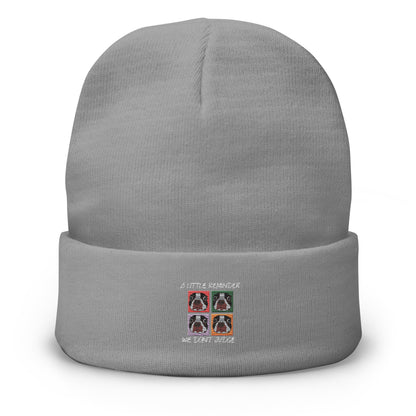 Gray beanie with embroidered design on a white background