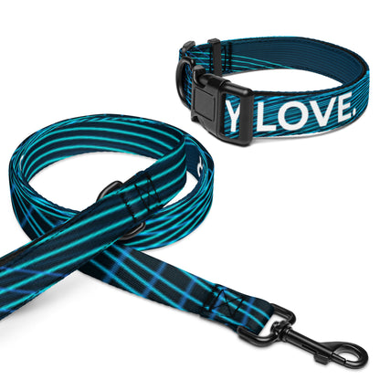 black and blue patterned pet collar and leash set on a white background. The adjustable collar has a black buckle and features the white text 'BOUND BY LOVE!' The leash has black metal hardware and a repeating blue diagonal stripe pattern.