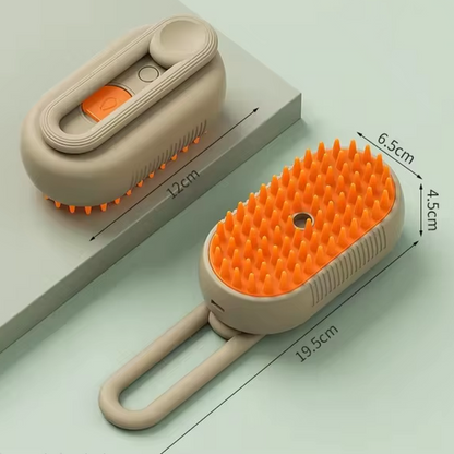 3-in-1 electric pet grooming brush with steam spray technology for dogs and cats. Beige and orange grooming brush with measurements on a light green background.