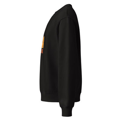 Black sweatshirt with a small orange and yellow logo on the sleeve against a white background