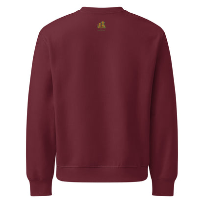 Maroon sweatshirt with a small logo on the back against a white background