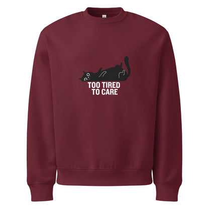 Maroon sweatshirt with a black cat graphic and 'Too Tired to Care' text on a white background