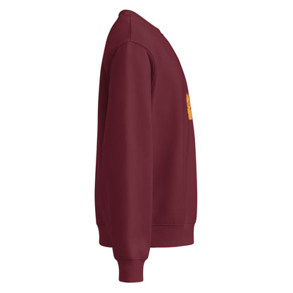 Maroon sweatshirt with a yellow patch on a white background