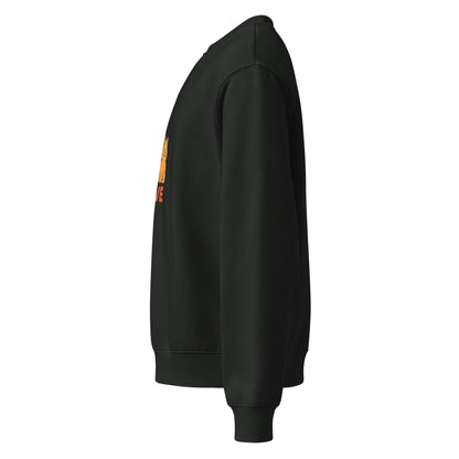 Black sweatshirt with orange and yellow design on sleeve against a white background