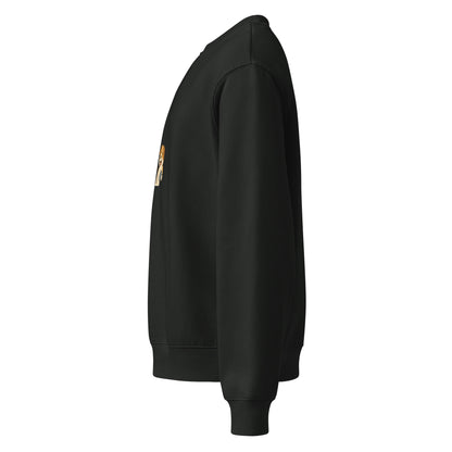 Black sweatshirt with a patch on the sleeve against a white background