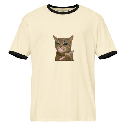 Beige t-shirt with a graphic of a cat blowing a bubble, on a white background