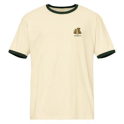 Beige t-shirt with green trim on a white background