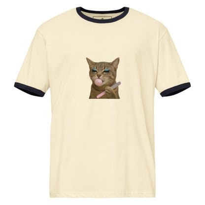 Beige t-shirt with a graphic of a cat blowing a bubble, on a white background